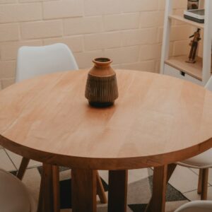 Home brown ceramic mug on round table