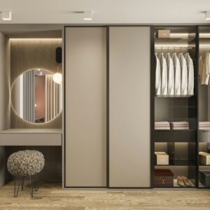 Home a walk in closet with a mirror and a stool